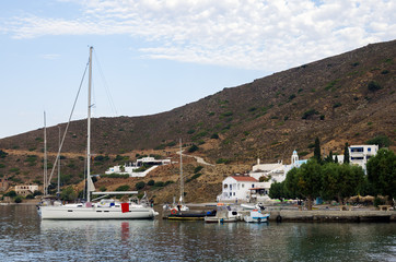 Fototapeta na wymiar Lovely scenery by the sea in Emporios village, Kalymnos island, Dodecanese, Greece 