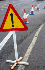 Attention sign. Road traffic limited. Triangle with red border. Bypass at the street