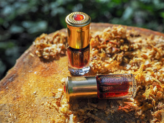Fragrant oil. Scented oil. Small bottle of Arabian Attar.   © sablinstanislav