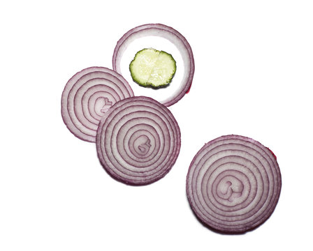 Onion and cucumber isolated on white background
