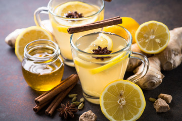 Ginger tea with lemon, honey and spices.