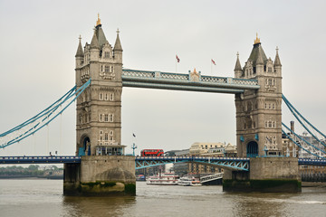 Fototapeta na wymiar Tower Bridge with red doubledecker bus