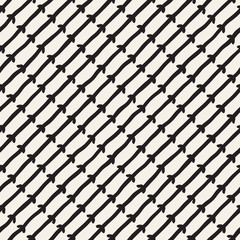 Seamless pattern with hand drawn lines. Abstract background with freehand brush strokes. Black and white texture. Ornament for wrapping paper.