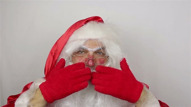 Santa say goodbye on grey background