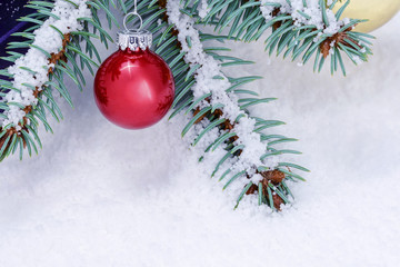 Christmas still life on white snow, Christmas tree gifts and balls