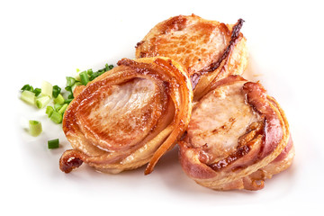 Pork fillet wrapped in bacon isolated on white background