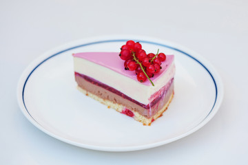 Sweet sliced cake at white plate