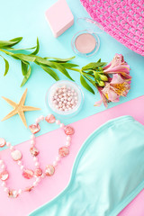 Composition with flowers, cosmetics and accessories on color background. Beauty blogger concept