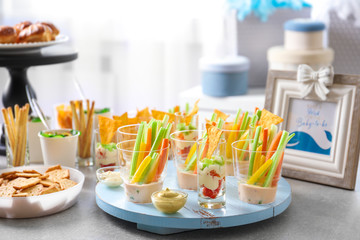 Tasty food for baby shower party on table