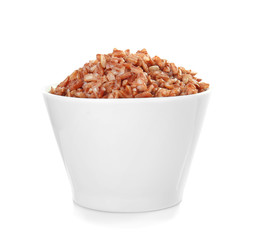 Bowl with red rice, isolated on white