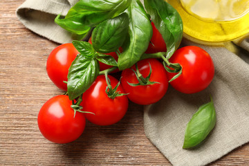 Fresh cherry tomatoes on wooden table