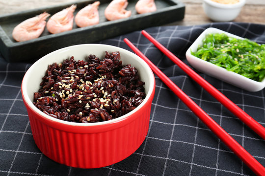 Ramekin With Red Rice On Table