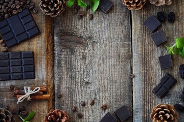 Beautiful Christmas wooden background with pine cones