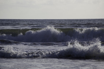 Ocean waves crashing on the beach