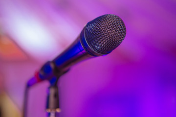 Microphone. Microphone on stage. Microphone close-up. A pub. Bar. A restaurant. Classical music....