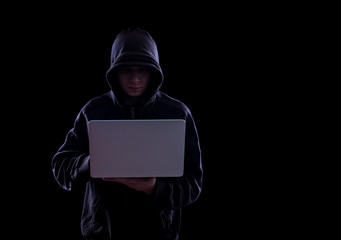 Anonymous hacker in the dark