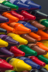 Many crayons in a pile