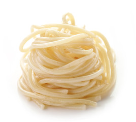 boiled spaghetti on a white background