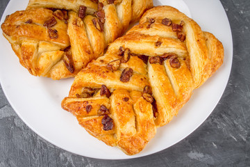 Danish pastry maple pecan with nuts and maple syrup