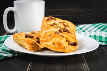 Danish pastry maple pecan with nuts and maple syrup