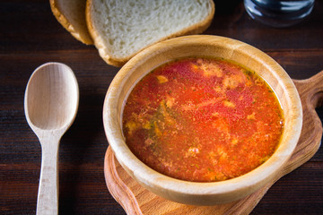 Traditional Ukrainian Russian vegetable borscht on the old wooden background