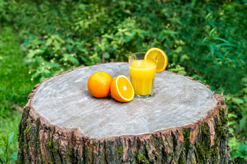 Fototapeta premium Fresh orange juice with oranges fruit