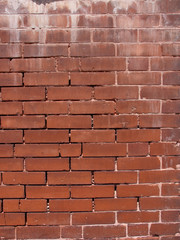 Close-up of paint streaked brick wall