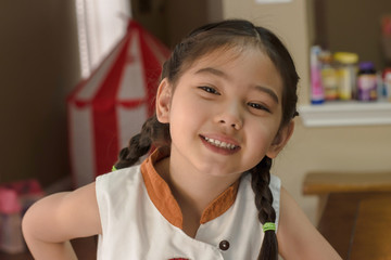 close up smiling little girl's face