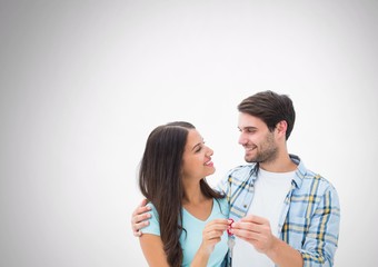 Couple Holding key in front of vignette