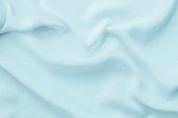 Abstract waving blue fabric texture background