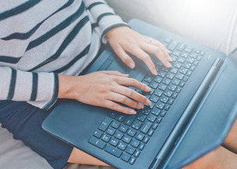 Fototapeta na wymiar Woman working using laptop and connecting wifi