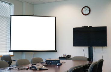 White projector screen and monitor in the meeting room