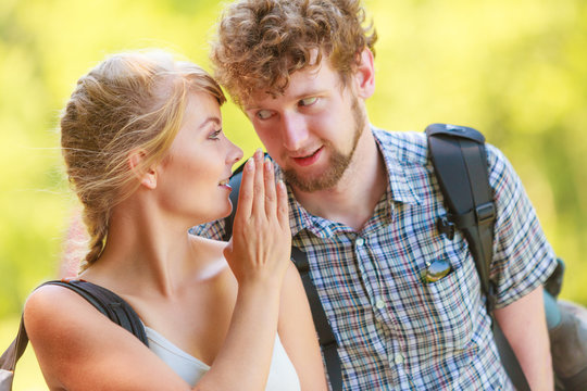 Woman telling her boyfriend some secrets
