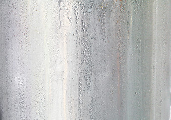 drops of cold water on surface stainless tank