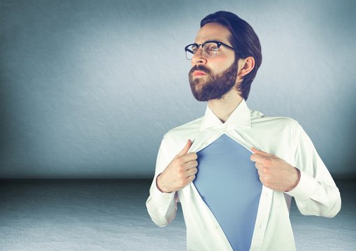 Millennial Man Opening Shirt In Blue Room