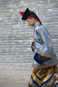 mongolian man in traditional outfit