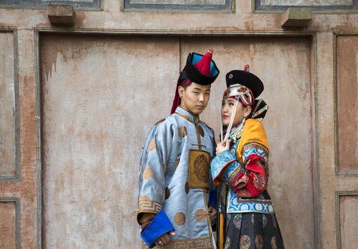 mongolian couple in traditional outfit