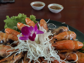 Grilled prawns on the plate.
