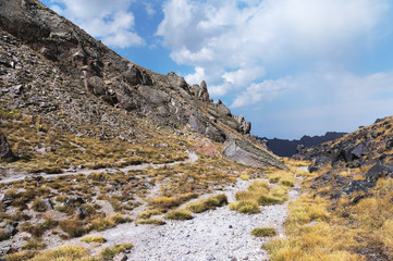 High-altitude path for trekking and climbing to the top of the Elbrus among the rocks