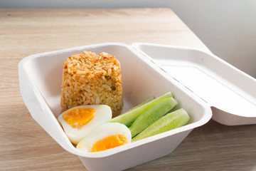 Fried rice with curry paste and boiled egg