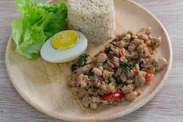 stir fried chicken whit basil on rice