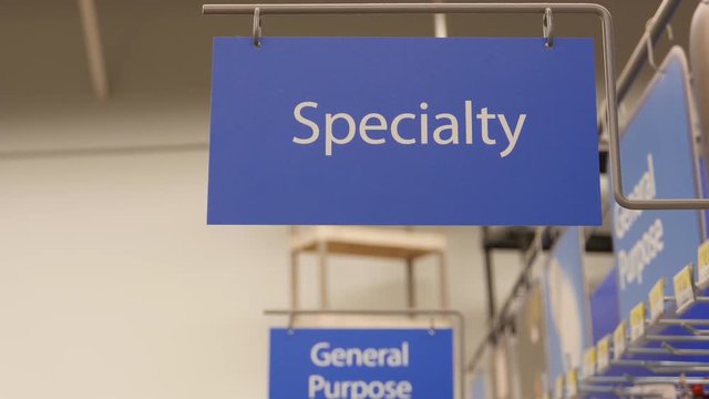 Motion of specialty sign on new smart bulb section inside Walmart store