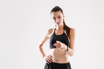 Portrait of a confident smiling sportswoman