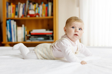 Fototapeta premium Portrait of cute baby girl wearing vintage clothes.