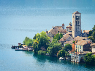 Fototapeta na wymiar The island of San Giulio by the Italian lake - lago d'Orta, Piemonte, Italy. 