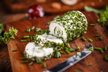 Soft cheeses rolled in chives