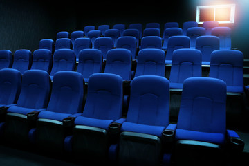 empty new blue seats in auditorium or movie theater