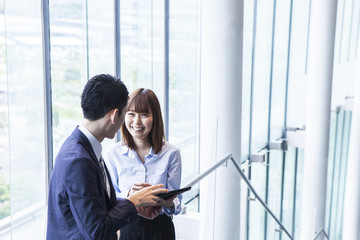 Business couple who has a happy conversation