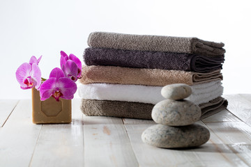 Fototapeta na wymiar eco-friendly bath or homemade laundry wash with zen pebbles
