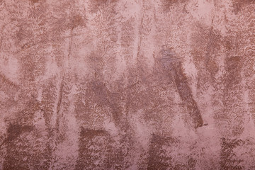 Textured plaster on the wall. Abstract brown background